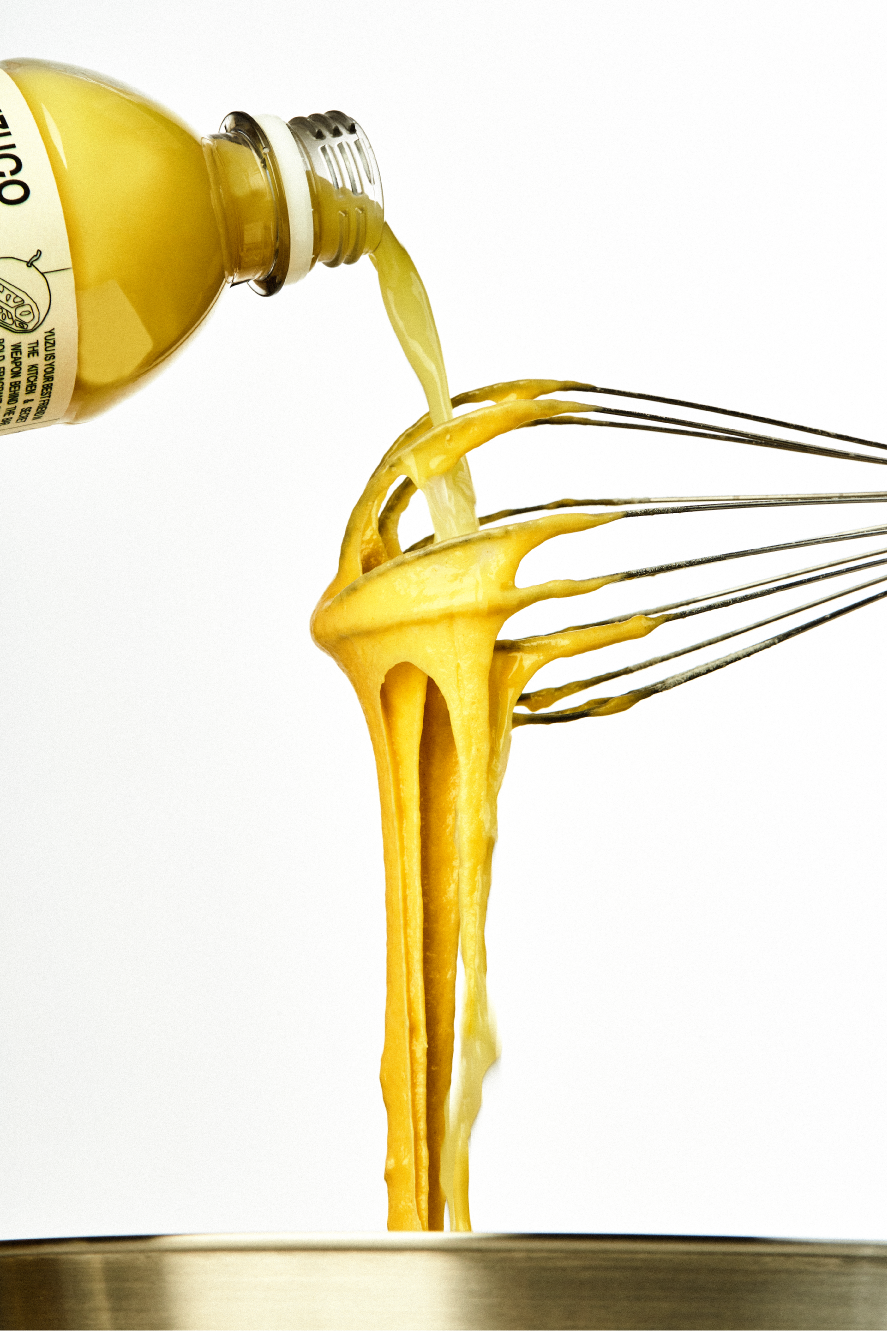 100% Yuzu Juice being poured into a batter
