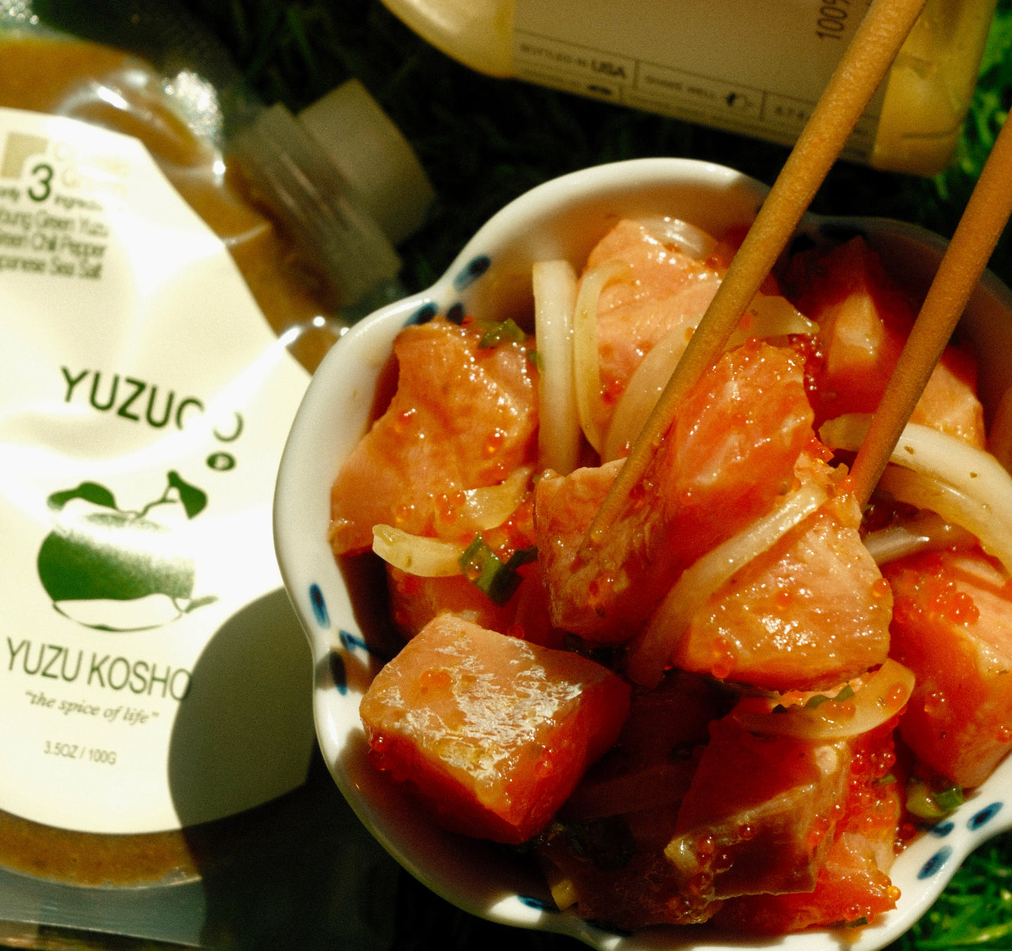 yuzu kosho poke with onions in a scallop shaped bowl