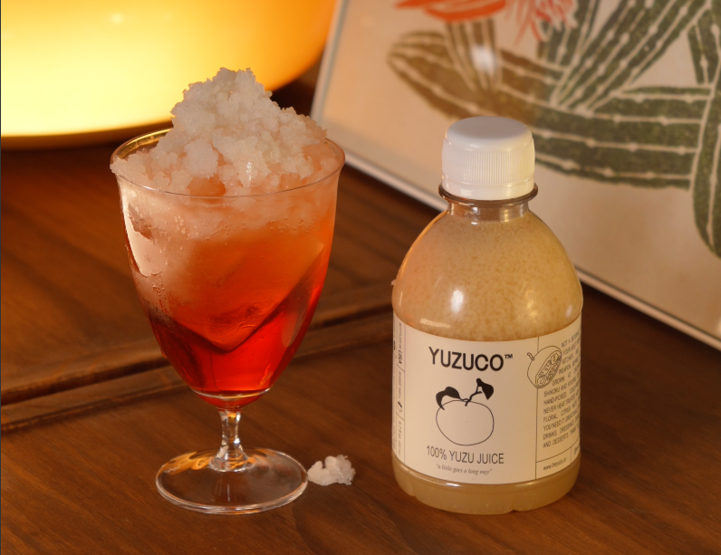yuzu americano with yuzu granita in a cocktail glass