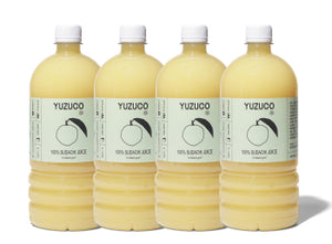 Front view of 4-pack of 36.4oz 100% Sudachi Juice bottles showcasing pale yellow juice and YUZUCO labels on white background