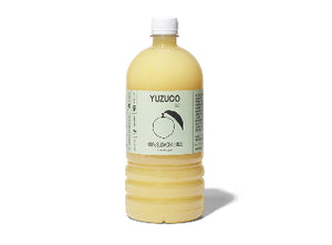 Front view of 36.4oz 100 percent sudachi juice bottle showcasing pale yellow juice and Yuzuco label on white background