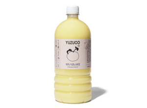 Front view of 36.4oz 100% Yuzu Juice bottle showcasing pale yellow juice and product label on white background