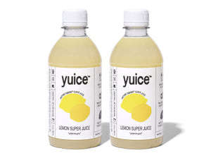 Front view of two 13 fl oz Lemon Super Juice bottles showcasing yellow labels and white caps on white background
