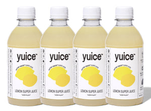 Front view of four 13 oz Lemon Super Juice bottles showcasing their labels on a white background