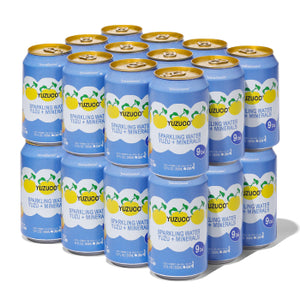 Front view of 24-pack of Sparkling Yuzu + Minerals 12oz cans showcasing stacked light-blue branded cans on white background