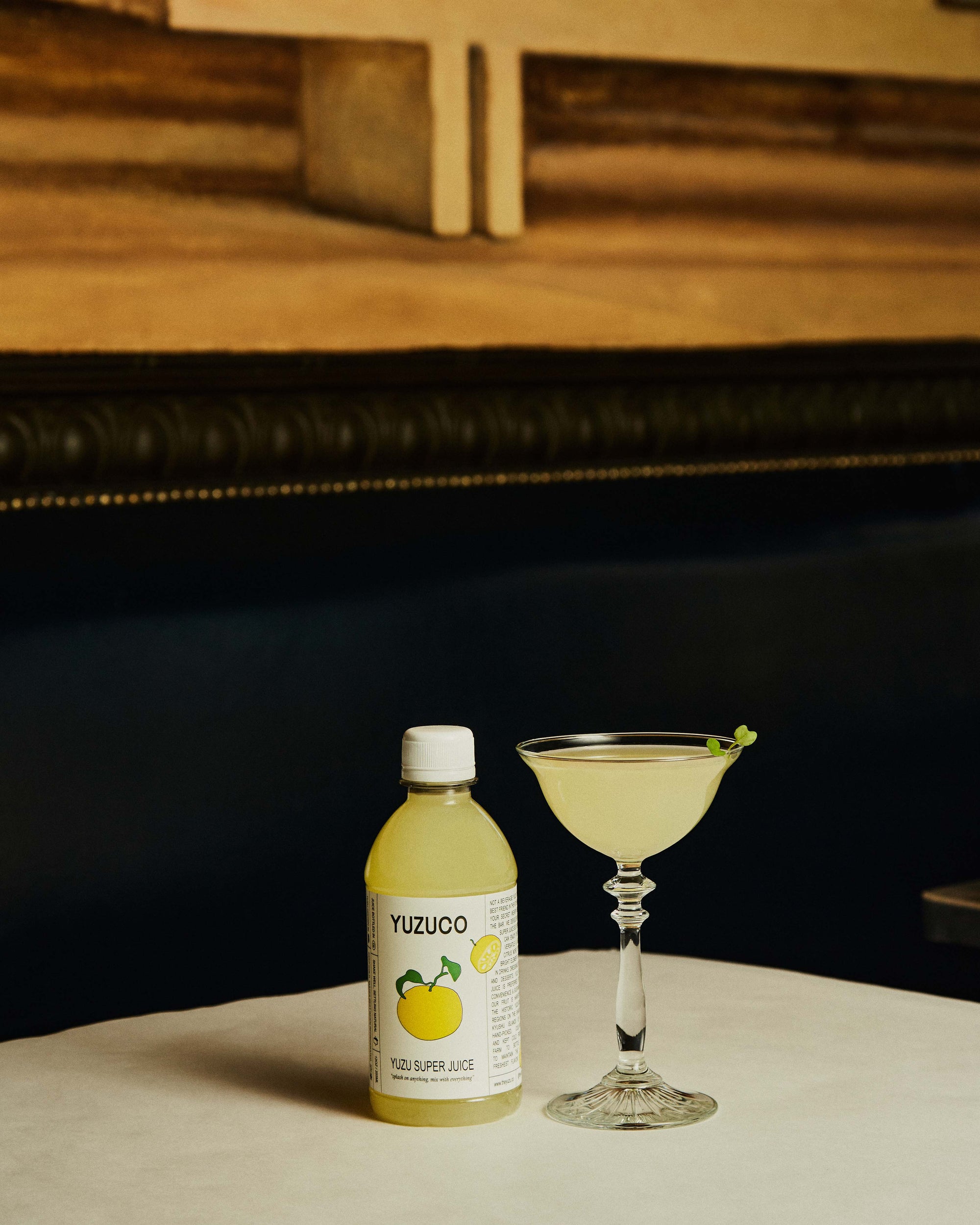 yuzu super juice next to a martini