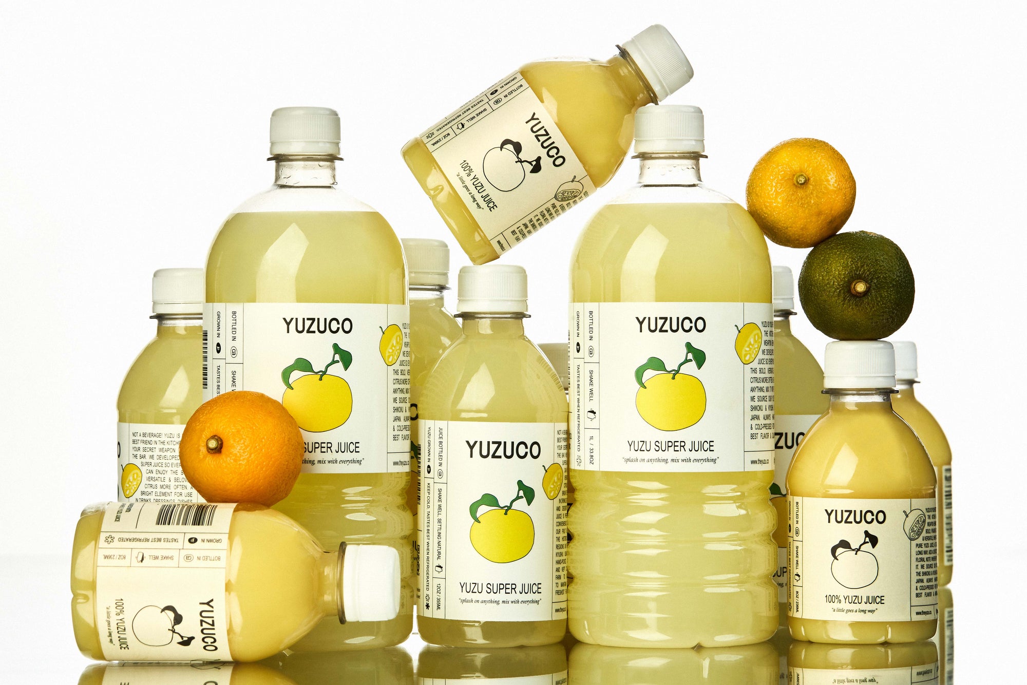 bottles of yuzuco juice all hanging out