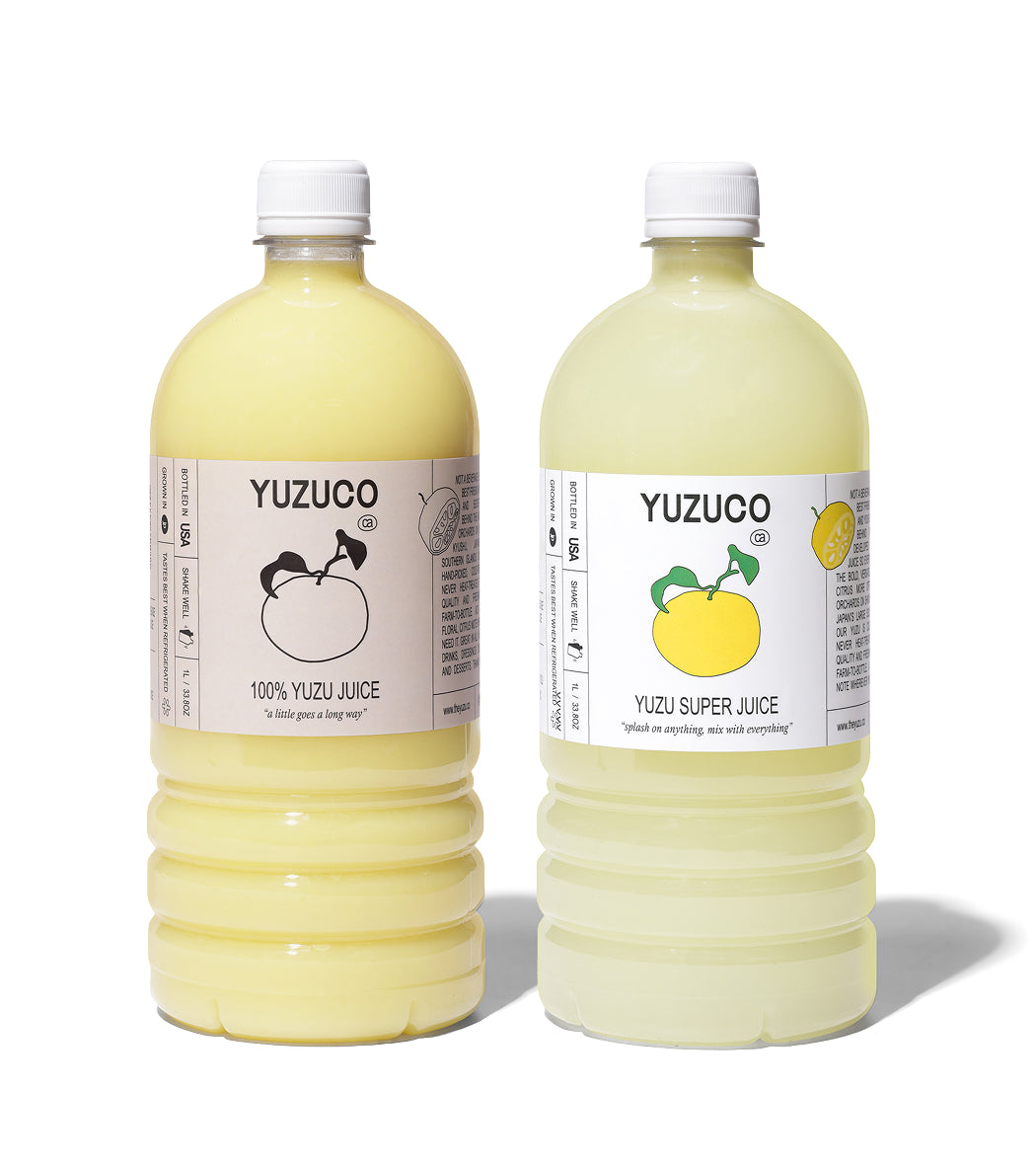 Front view of Yuzu Duo two-bottle set showcasing 100 percent Yuzu Juice and Yuzu Super Juice labels on white background
