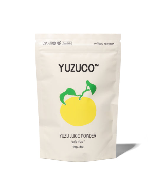 Front view of Yuzu Juice Powder pouch showcasing Gold dust and 100 grams, 3.5 ounces on a white background
