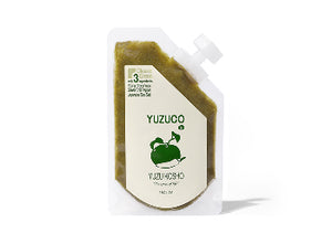 Front view of Green Yuzu Kosho pouch showcasing YUZUCO label and green yuzu illustration on white background