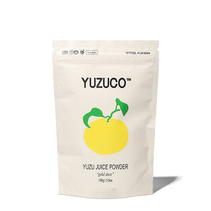 Front-facing pouch of Yuzu Juice Powder showcasing the YUZUCO logo and yellow yuzu illustration on a white background