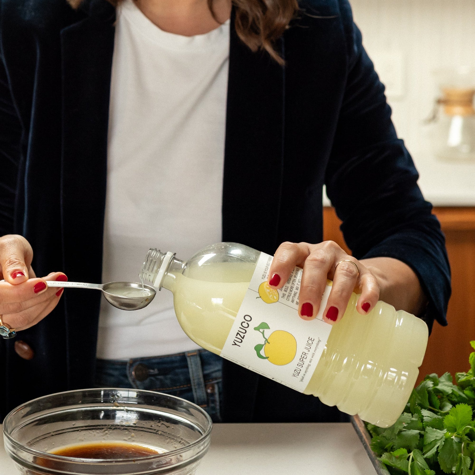 yuzu super juice 1L being added to soy sauce based dressing